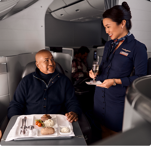 Man eating on a plane