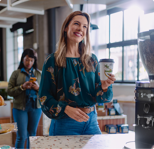 Woman buying coffee